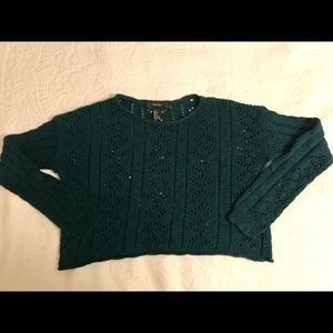 A crop top sweater